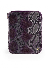 THE LOOKPython-printed fabricRectangular silhouetteTop zip closureSignature goldtone studs on the pull and frontSoftly padded interiorAccomodates the iPad skin for iPad and iPad 2THE MEASUREMENT8½W X 10½H X ½DTHE MATERIALFabricNylon liningORIGINImportedPlease note: iPad® not included. THE LOOKPython-printed fabricRectangular silhouetteTop zip closureSignature goldtone studs on the pull and frontSoftly padded interiorAccomodates the iPad skin for iPad and iPad 2THE MEASUREMENT8½W X 10½H X ½DTHE MATERIALFabricNylon liningORIGINImportedPlease note: iPad® not included.