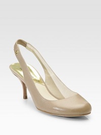 Lustrous leather creates a coveted style lady's love.Stacked heel, 3 (75mm) Elastic slingback Goldtone logo hardware Leather lining Padded insole Rubber sole Imported Lustrous leather creates a coveted style lady's love.Stacked heel, 3 (75mm) Elastic slingback Goldtone logo hardware Leather lining Padded insole Rubber sole Imported