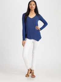 An easy-to-wear shirt of soft-stretch fabric in a modern asymmetrical silhouette. Deep v-neckDropped shouldersLong sleevesAsymmetrical hemViscoseMachine washMade in USAModel shown is 5'11 (178cm) wearing US size Small. An easy-to-wear shirt of soft-stretch fabric in a modern asymmetrical silhouette. Deep v-neckDropped shouldersLong sleevesAsymmetrical hemViscoseMachine washMade in USAModel shown is 5'11 (178cm) wearing US size Small.