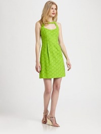 Vibrant cotton eyelet styled with a cutout halter neckline and pleated waist.Cutout necklineBodice dartsEmpire waistBack cutouts with button closuresCenter back zipperAbout 19 from natural waistCottonDry cleanMade in USA of imported fabricModel shown is 5'10 (177cm) wearing US size 4. Vibrant cotton eyelet styled with a cutout halter neckline and pleated waist.Cutout necklineBodice dartsEmpire waistBack cutouts with button closuresCenter back zipperAbout 19 from natural waistCottonDry cleanMade in USA of imported fabricModel shown is 5'10 (177cm) wearing US size 4.