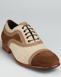 Salvatore Ferragamo mixes panels of suede, leather and canvas to striking effect in the Basilea oxford. Salvatore Ferragamo mixes panels of suede, leather and canvas to striking effect in the Basilea oxford.