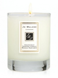 Add the finishing touch to your home by decorating interiors with the refreshingly delicious scent of Grapefruit. This 2.1 oz. scented travel candle will help create the perfect ambience in any room. Burn time approx. 15 hrs. Add the finishing touch to your home by decorating interiors with the refreshingly delicious scent of Grapefruit. This 2.1 oz. scented travel candle will help create the perfect ambience in any room. Burn time approx. 15 hrs.