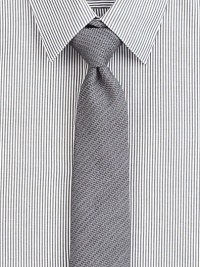 Solid silk blend tie with subtle textured stripe pattern.About 2½ wide36% viscose/29% silk/21% wool/14% mohairDry cleanMade in USA of Italian fabric Solid silk blend tie with subtle textured stripe pattern.About 2½ wide36% viscose/29% silk/21% wool/14% mohairDry cleanMade in USA of Italian fabric