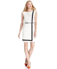 A solid band of contrasting trim highlights the sleek structure of Calvin Klein's new faux-wrap dress. A solid band of contrasting trim highlights the sleek structure of Calvin Klein's new faux-wrap dress.