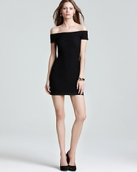 Cut a curve-defining silhouette in this BCBGeneration dress, tailored in an off-the-shoulder design for a subtle hint of skin. Cut a curve-defining silhouette in this BCBGeneration dress, tailored in an off-the-shoulder design for a subtle hint of skin.