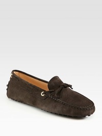 Menswear-inspired designs are an absolute must for all seasons. This suede staple has intricate stitching, front laces and a rubber sole for added traction. Suede upperLeather liningRubber solePadded insoleMade in Italy Menswear-inspired designs are an absolute must for all seasons. This suede staple has intricate stitching, front laces and a rubber sole for added traction. Suede upperLeather liningRubber solePadded insoleMade in Italy