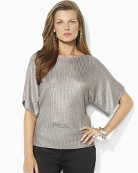 A sleek boatneck sweater crafted in a metallic knit exudes chic, cozy style with relaxed dolman sleeves. A sleek boatneck sweater crafted in a metallic knit exudes chic, cozy style with relaxed dolman sleeves.