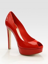 Polished patent leather in a classic peep toe silhouette with a silvertone Dior emblem at the heel. Self-covered heel, 5 (125mm) Covered platform, 1¼ (30mm) Compares to a 3¾ heel (95mm) Patent leather upper Leather lining and sole Padded insole Made in ItalyOUR FIT MODEL RECOMMENDS ordering one half size up as this style runs small. Polished patent leather in a classic peep toe silhouette with a silvertone Dior emblem at the heel. Self-covered heel, 5 (125mm) Covered platform, 1¼ (30mm) Compares to a 3¾ heel (95mm) Patent leather upper Leather lining and sole Padded insole Made in ItalyOUR FIT MODEL RECOMMENDS ordering one half size up as this style runs small.