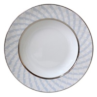 Carefully rendered in a style reminiscent of neoclassic trompe l'oeil-a French term for artwork that depicts optical illusions-a captivating geometric rosette motif traverses this elegant porcelain soup bowl from Bernardaud. Delicate shades of ice blue, mother-of-pearl and gray are enhanced by a fine platinum trim. Carefully rendered in a style reminiscent of neoclassic trompe l'oeil-a French term for artwork that depicts optical illusions-a captivating geometric rosette motif traverses this elegant porcelain soup bowl from Bernardaud. Delicate shades of ice blue, mother-of-pearl and gray are enhanced by a fine platinum trim.