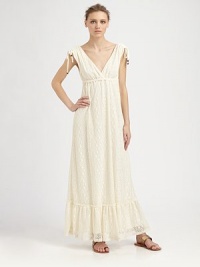 Delicate lace in a floor-sweeping maxi silhouette, tucked and gathered for a shapely fit.Ruched shouldersCrossover V necklineEmpire waistRuffled hemAbout 40 from natural waist70% cotton/30% polyesterDry cleanMade in USAModel shown is 5'10 (177cm) wearing US size Small. Delicate lace in a floor-sweeping maxi silhouette, tucked and gathered for a shapely fit.Ruched shouldersCrossover V necklineEmpire waistRuffled hemAbout 40 from natural waist70% cotton/30% polyesterDry cleanMade in USAModel shown is 5'10 (177cm) wearing US size Small.