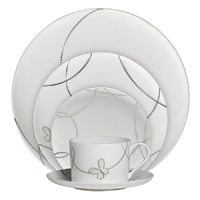 Designed with a modern bride in mind, the Lismore Butterfly dinnerware collection features a contemporary coupe shape accented with a soft iridescent lavender butterfly motif. Designed with a modern bride in mind, the Lismore Butterfly dinnerware collection features a contemporary coupe shape accented with a soft iridescent lavender butterfly motif.