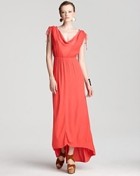 A drapey cowlneck and high/low hem adds interest to this vibrantly hued XCVI maxi dress. A drapey cowlneck and high/low hem adds interest to this vibrantly hued XCVI maxi dress.