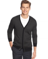 A modern revision of the classic staple. Calvin Klein's pinstripe cardigan is not your typical grandpa sweater. A modern revision of the classic staple. Calvin Klein's pinstripe cardigan is not your typical grandpa sweater.