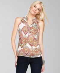 A flounce at the neckline lends INC's exotic-print top extra feminine flair. A flounce at the neckline lends INC's exotic-print top extra feminine flair.