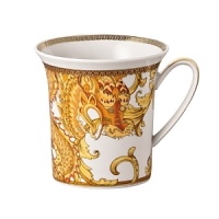 The most legendary figure of Asian mythology, the red dragon rises majestically from this fabulously opulent dinnerware from Rosenthal Meets Versace, conveying all its might and glory. Each piece features ornate golden baroque patterns and four small medallions representing the sun, and the Versace medusa decorates the background. The most legendary figure of Asian mythology, the red dragon rises majestically from this fabulously opulent dinnerware from Rosenthal Meets Versace, conveying all its might and glory. Each piece features ornate golden baroque patterns and four small medallions representing the sun, and the Versace medusa decorates the background.