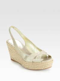 Shimmery metallic leather upper with a stretchy slingback and classic espadrille wedge. Hemp wedge, 3 (75mm)Hemp platform, 1 (25mm)Compares to a 2 heel (50mm)Metallic leather upperLeather liningRubber solePadded insoleImportedOUR FIT MODEL RECOMMENDS ordering one half size up as this style runs small. Shimmery metallic leather upper with a stretchy slingback and classic espadrille wedge. Hemp wedge, 3 (75mm)Hemp platform, 1 (25mm)Compares to a 2 heel (50mm)Metallic leather upperLeather liningRubber solePadded insoleImportedOUR FIT MODEL RECOMMENDS ordering one half size up as this style runs small.