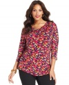 Revitalize your neutral bottoms with Style&co.'s printed plus size top, finished by a draped neckline.