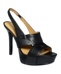 Anything goes. The sassy silhouette and chunky platform of the Fairgame sandals by Nine West liven up both the conference room and cocktail hour. Anything goes. The sassy silhouette and chunky platform of the Fairgame sandals by Nine West liven up both the conference room and cocktail hour.