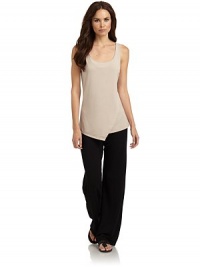 THE LOOKScoopneckSleevelessAsymmetric mock wrap detail in frontTHE FITAbout 26 from shoulder to hemTHE MATERIAL62% polyester/33% rayon/5% spandexCARE & ORIGINMachine washImportedModel shown is 5'11 (179cm) wearing US size Small. THE LOOKScoopneckSleevelessAsymmetric mock wrap detail in frontTHE FITAbout 26 from shoulder to hemTHE MATERIAL62% polyester/33% rayon/5% spandexCARE & ORIGINMachine washImportedModel shown is 5'11 (179cm) wearing US size Small.