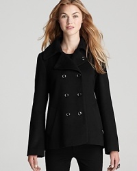 An Aqua double-breasted pea coat with back pleat makes an uptown-chic addition to your winter wardrobe. An Aqua double-breasted pea coat with back pleat makes an uptown-chic addition to your winter wardrobe.