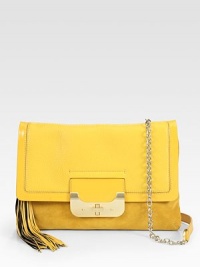 Glossy patent leather and soft suede with a playful tassel detail.Detachable shoulder strap, 20½ dropTurn-lock and flap closureOne outside open pocketDetachable tassel detailOne inside zip pocketThree inside open pocketsFully lined14W X 10H X 1DImported Glossy patent leather and soft suede with a playful tassel detail.Detachable shoulder strap, 20½ dropTurn-lock and flap closureOne outside open pocketDetachable tassel detailOne inside zip pocketThree inside open pocketsFully lined14W X 10H X 1DImported
