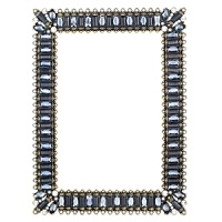 Give favorite photos the artful presentation they deserve. This cast-pewter frame from Olivia Riegel is embellished with sparkling hand-set Swarovski® crystals, sapphire-colored glass gems, blue cat's eye and faux pearls.