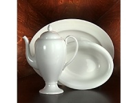 Nothing is more practical and versatile than this hostess' classic. Use it as is or dress it up in glittering metallics or your favorite colors. Bone china. Nothing is more practical and versatile than this hostess' classic. Use it as is or dress it up in glittering metallics or your favorite colors. Bone china.