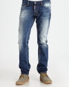 Premium Italian denim in a medium-indigo rinse exudes a lifetime of wear and tear, crafted with a classically comfortable straight-leg fit and generous whiskering and fading throughout the leg.Five-pocket styleInseam, about 33CottonMachine washMade in Italy 