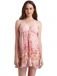 THE LOOKVibrant floral printAdjustable shoulder strapsV-neck with soft cupsElastic Empire waistCascading ruffles under the bustPartial open frontTHE FITAbout 33 from shoulder to hemTHE MATERIALPolyesterCARE & ORIGINMachine washImported THE LOOKVibrant floral printAdjustable shoulder strapsV-neck with soft cupsElastic Empire waistCascading ruffles under the bustPartial open frontTHE FITAbout 33 from shoulder to hemTHE MATERIALPolyesterCARE & ORIGINMachine washImported