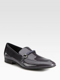 Slip-on classic crafted from shiny patent leather with woven detailing and signature ornament.Patent leather upperLeather liningPadded insoleLeather soleMade in Italy Slip-on classic crafted from shiny patent leather with woven detailing and signature ornament.Patent leather upperLeather liningPadded insoleLeather soleMade in Italy