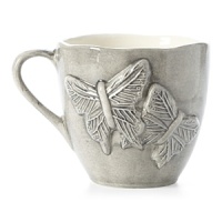 Broad-winged butterflies decorate this substantially sized, handcrafted ceramic mug. Subtle variations in color and slightly irregular rims give each piece an artfully organic warmth. Broad-winged butterflies decorate this substantially sized, handcrafted ceramic mug. Subtle variations in color and slightly irregular rims give each piece an artfully organic warmth.