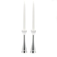 Recite your Sabbath blessings in the presence of candles lit in this pair of noble, clean-lined candleholders. The sticks rise triumphantly to cup and hold the candles and the dancing light reflects off the metal. Individual artists use Nambe, a superior metal alloy that retains heat and cold. Candleholders stand 8 high.