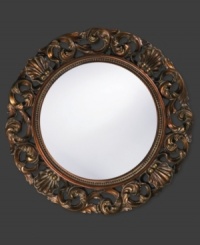 Open clamshells mingle with curling leaves in a mottled bronze ring with inner beading. Alluring on the bedroom, living room or foyer wall, this round mirror dresses up any space with timeless, lasting beauty. Open clamshells mingle with curling leaves in a mottled bronze ring with inner beading. Alluring on the bedroom, living room or foyer wall, this round mirror dresses up any space with timeless, lasting beauty.