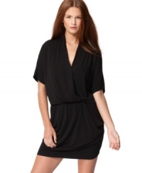 Draping and cute pockets lend plenty of flair to this RACHEL Rachel Roy number. Draping and cute pockets lend plenty of flair to this RACHEL Rachel Roy number.