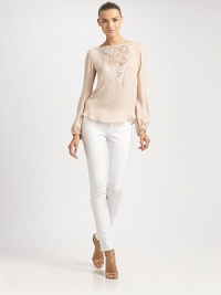 Supple silk, tailored in a blouson style and embellished with a romantic lace inset.BoatneckV-front lace insetLong blouson sleeves with button cuffsBack keyhole with button closureSilkDry cleanMade in Italy of imported fabricModel shown is 5'11 (180cm) wearing US size 4. Supple silk, tailored in a blouson style and embellished with a romantic lace inset.BoatneckV-front lace insetLong blouson sleeves with button cuffsBack keyhole with button closureSilkDry cleanMade in Italy of imported fabricModel shown is 5'11 (180cm) wearing US size 4.