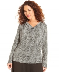 Slither into one of the season's hottest looks with Jones New York Signature's long sleeve plus size top, featuring a snakeskin-print. Slither into one of the season's hottest looks with Jones New York Signature's long sleeve plus size top, featuring a snakeskin-print.