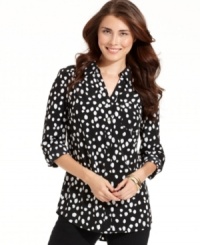 A brushstroke dot print adds an artsy vibe to this button-up petite blouse from Style&co. A brushstroke dot print adds an artsy vibe to this button-up petite blouse from Style&co.