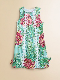 Vibrant florals on pure cotton, accented with lace and bow accents. JewelneckSleevelessTwo bands of lace down the center frontSide bows on the hemBack zipperCottonFully linedMachine washImported Vibrant florals on pure cotton, accented with lace and bow accents. JewelneckSleevelessTwo bands of lace down the center frontSide bows on the hemBack zipperCottonFully linedMachine washImported