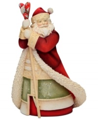 Spread the love this holiday season. This figurine stands tall on any table or mantle as Santa Claus, in traditional robe and hat, holds a heart-shaped staff. With crystal accents. Spread the love this holiday season. This figurine stands tall on any table or mantle as Santa Claus, in traditional robe and hat, holds a heart-shaped staff. With crystal accents.