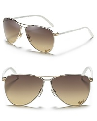 Whether you're cruising Miami Beach or the Amalfi Coast, count on the sleek lines of Gucci's chic white aviators to keep you cool. Whether you're cruising Miami Beach or the Amalfi Coast, count on the sleek lines of Gucci's chic white aviators to keep you cool.