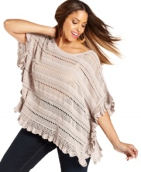 Metallic sheen adds a unique touch to INC's plus size swingy sweater. The open knit and scalloped hem give this look an extra dose of feminine charm. Metallic sheen adds a unique touch to INC's plus size swingy sweater. The open knit and scalloped hem give this look an extra dose of feminine charm.
