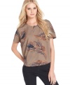 An allover feather print lends a modern boho vibe to this Kensie top -- in a stylishly slouchy fit!