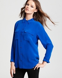Brighten your day with the classic tailored silhouette of this silk Equipment blouse. Pair with ponte pants and pumps for office aplomb. Brighten your day with the classic tailored silhouette of this silk Equipment blouse. Pair with ponte pants and pumps for office aplomb.