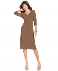 A graceful crossover bodice lends refined elegance to this alluring B-Slim dress from Elementz. A graceful crossover bodice lends refined elegance to this alluring B-Slim dress from Elementz.