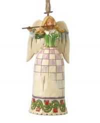 Start the decorating bonanza off on a high note with Jim Shore's Angel with Flute. Part ornament, part figurine, this elaborately hand-painted charmer makes your entire home sing. Start the decorating bonanza off on a high note with Jim Shore's Angel with Flute. Part ornament, part figurine, this elaborately hand-painted charmer makes your entire home sing.