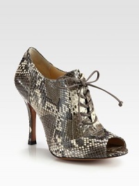 Trend-forward silhouette in luxurious python with smooth leather laces and a sexy peep toe. Self-covered heel, 4 (100mm)Python upper with leather lacesPeep toeLeather lining and solePadded insoleImported Trend-forward silhouette in luxurious python with smooth leather laces and a sexy peep toe. Self-covered heel, 4 (100mm)Python upper with leather lacesPeep toeLeather lining and solePadded insoleImported