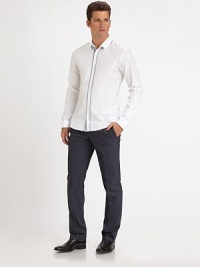 Stylishly handsome, in a slim-fitting silhouette, crafted in the finest quality cotton.ButtonfrontCovered placketAbout 28 from shoulder to hemCottonDry cleanImported