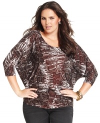 Dazzle in Seven7 Jeans' three-quarter-sleeve plus size top, featuring a snakeskin-print! Dazzle in Seven7 Jeans' three-quarter-sleeve plus size top, featuring a snakeskin-print!
