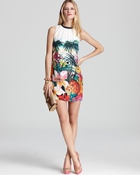 Take off to the tropics with this Juicy Couture sundress that boasts a kaleidoscope of fresh florals.