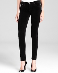 Slimming, dark wash AG Adriano Goldschmied jean leggings crafted from a velvety-soft fabric for combined comfort and chic in a classic five-pocket silhouette. Slimming, dark wash AG Adriano Goldschmied jean leggings crafted from a velvety-soft fabric for combined comfort and chic in a classic five-pocket silhouette.